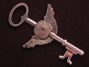 Pendant Silver Colored Key With Wings